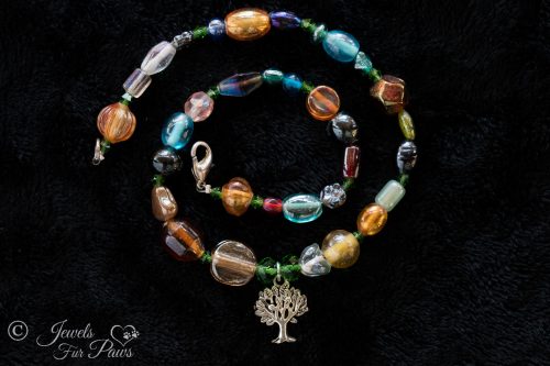 dog cat pet necklace tree of life charm multi colored irregular beads orange brown green blue red on black background