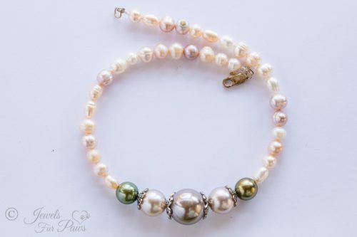 dog cat pet necklace with small green pearls larger champagne brown pearls on white background