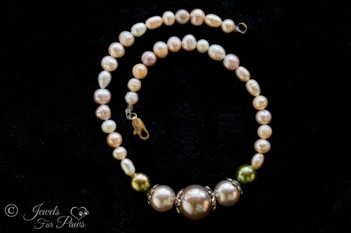 dog cat pet necklace with small green pearls larger champagne brown pearls on black background