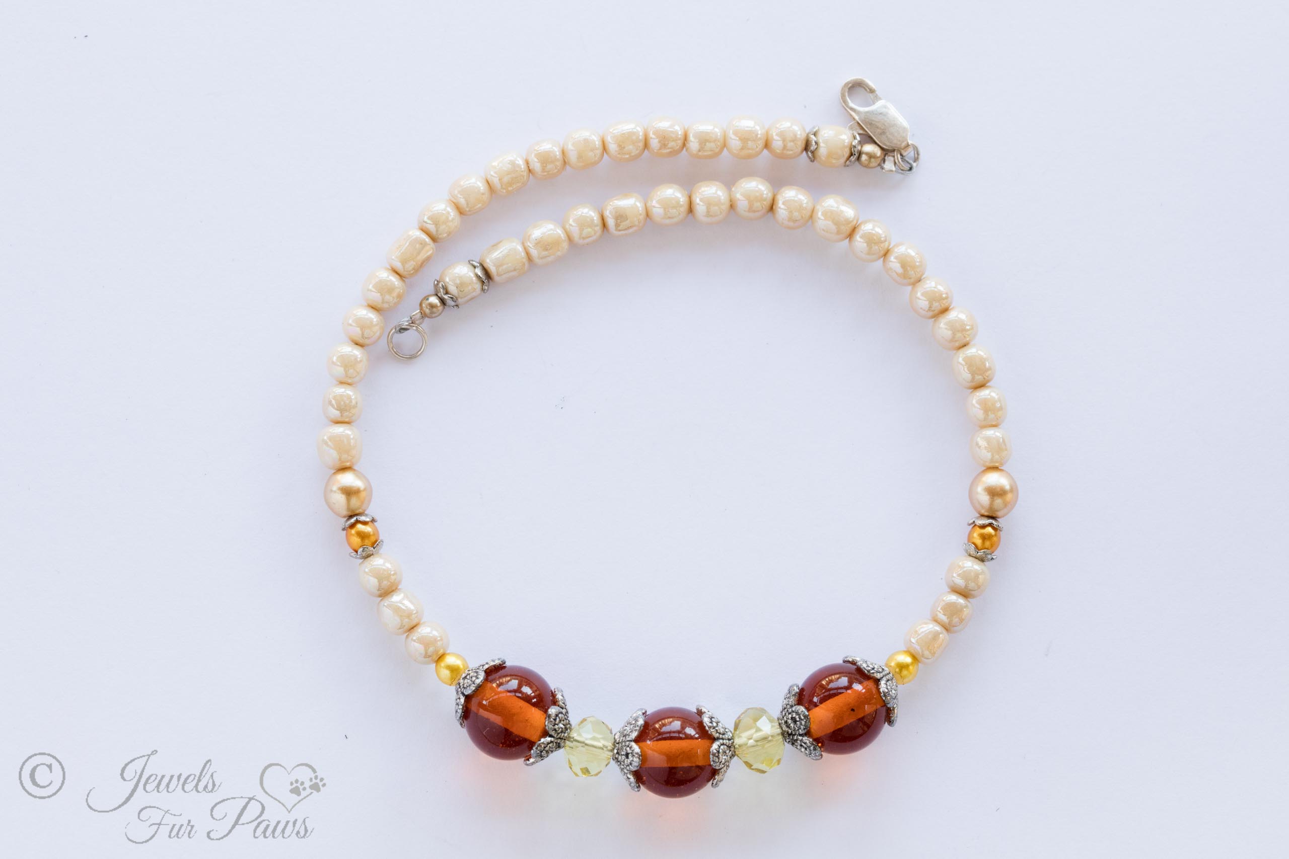 dog cat pet necklace vintage japanese round amber glass beads with baroque pearls swarovski crystals and silver spacers on a white background