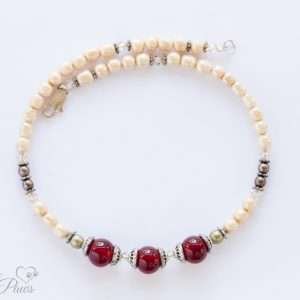 three antique vintage Japanese cherry glass stones with vintage Japanese pearls with silver spacers, silver pearls on a white background