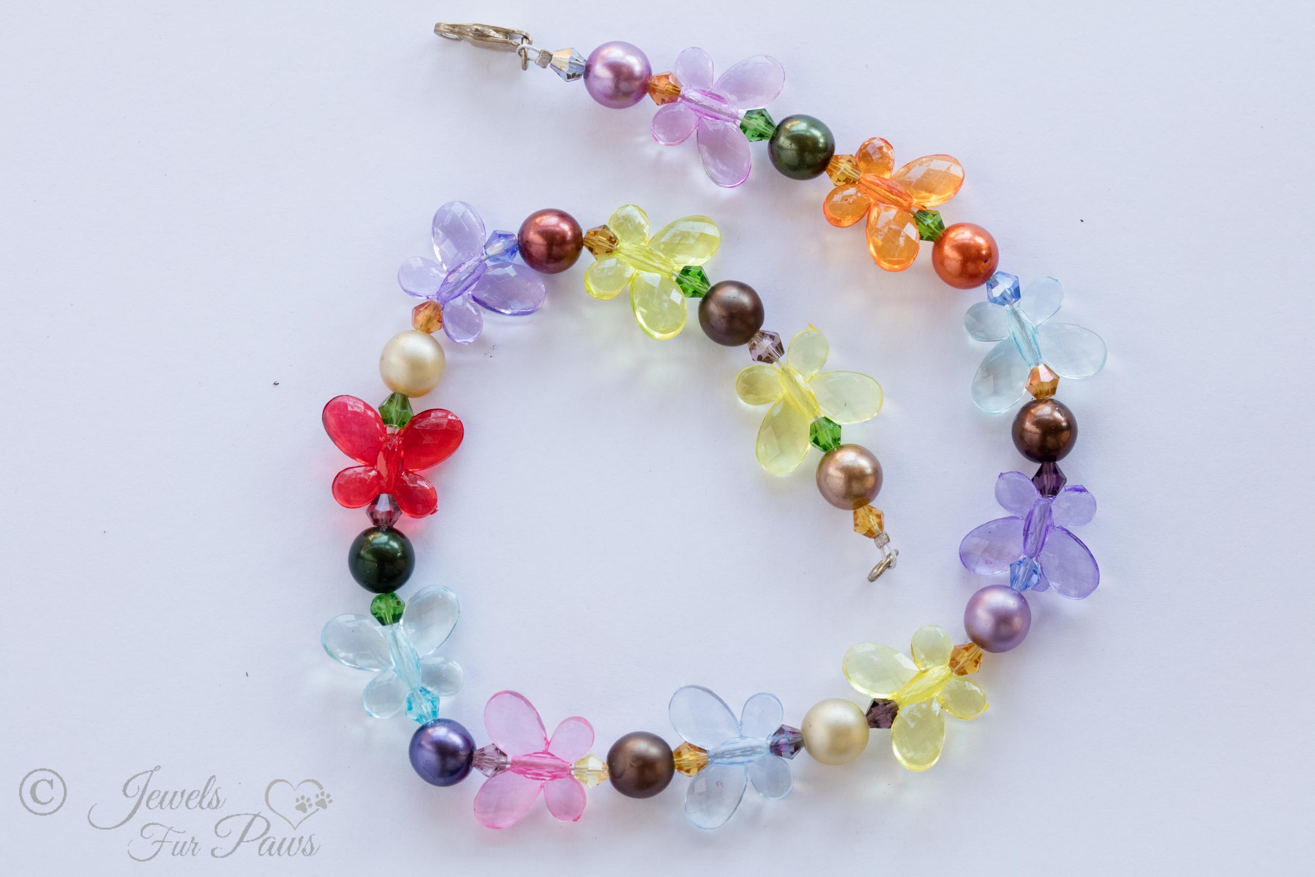 dog cat pet necklace multi colored butterflies with pearl spacers on white background