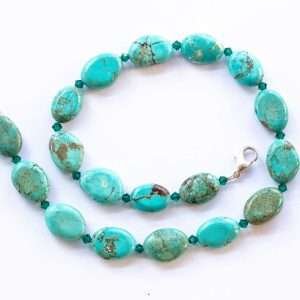 flat oval turquoise beads with turquoise blue czech crystal spacers on a white background medium dog cat pet jewelry necklace