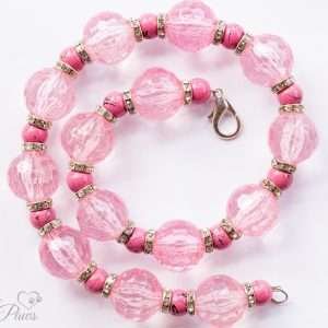 large pale pink faceted Czech crystals with smaller marbleized pink beads and channel set rhinstone spacers on a white background pet dog cat jewelry necklaces