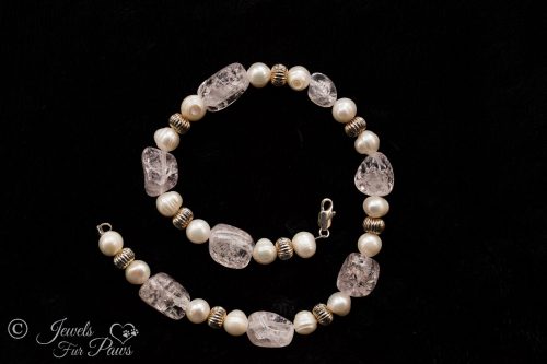 rose quartz and rhondells on black background