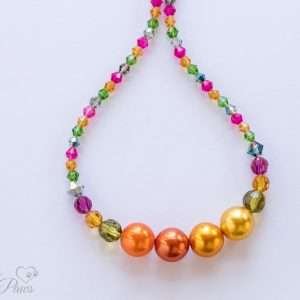 dog cat pet necklace with four large orange pearl beads multi colored swarovski crystals on white background