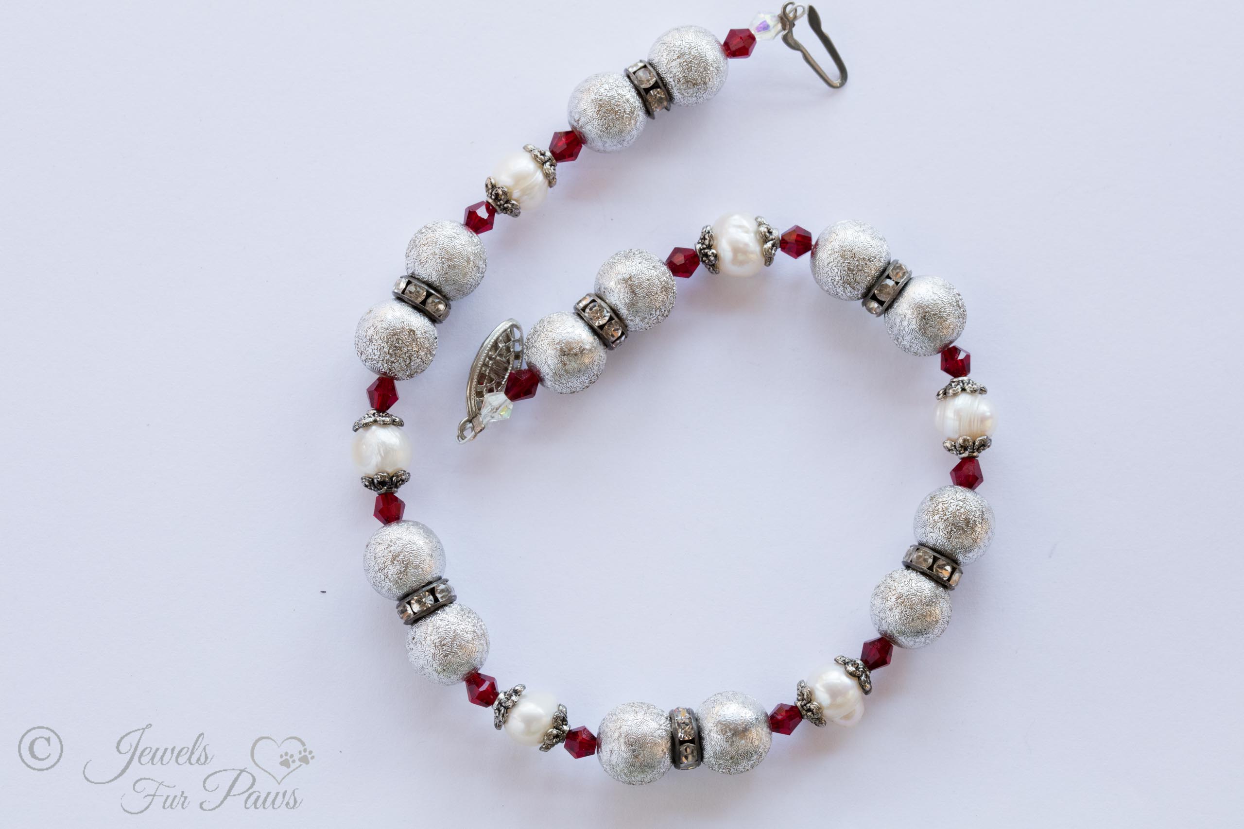 small cat dog pet necklace jewelry with hammered silver beads, cultured pearls silver spacers and red czech crystal spacers on white background