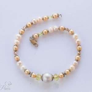 cultured pearl necklace with champagne pearls, large pearl, silver spacers for small dogs on white background