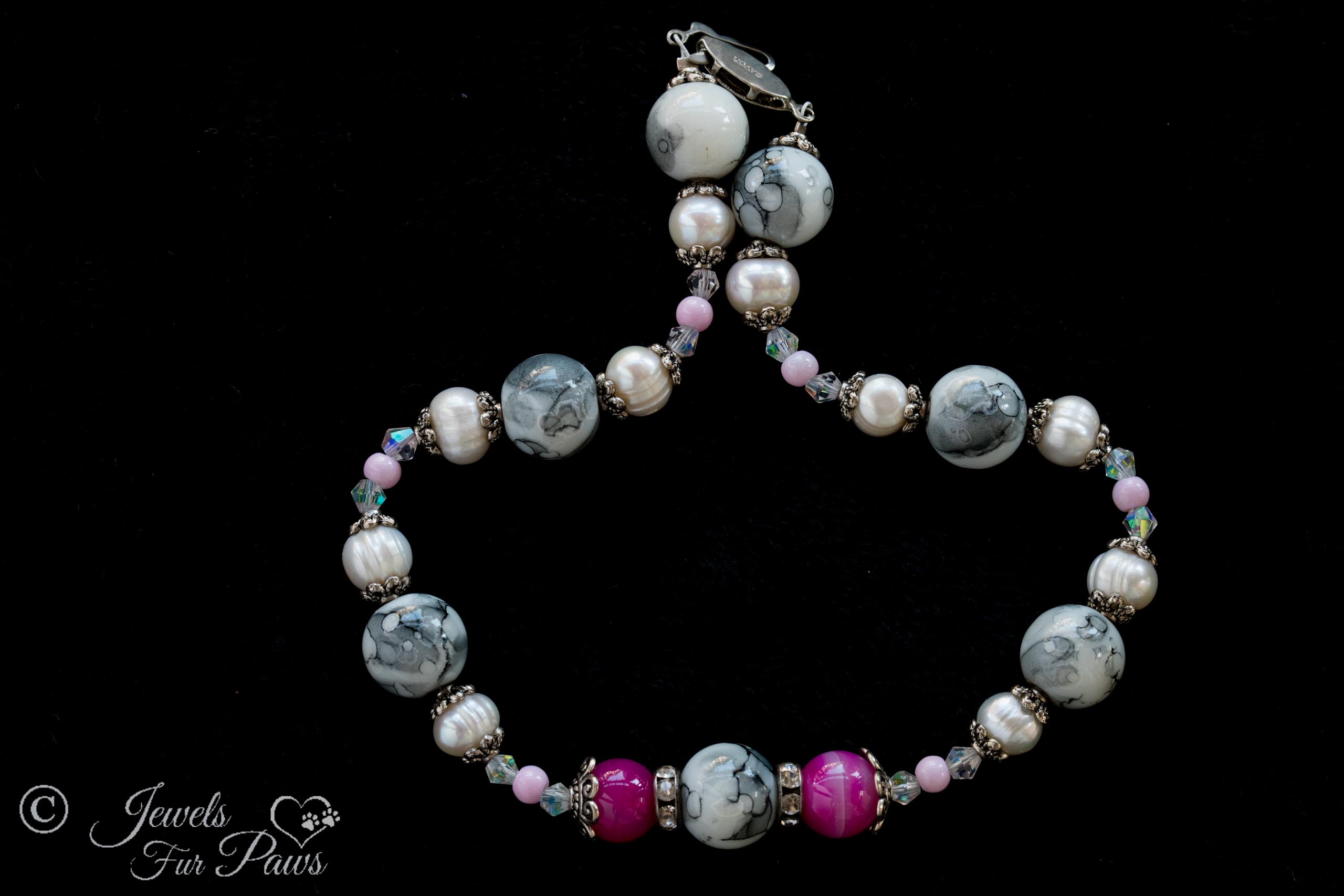 grey marbleized beads with two fuchsia beads, cultured pearls on black background for medium dog pet necklaces pet jewelry