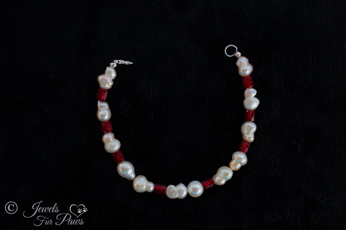 natural pearls with red crystal barrel beads on black background small dog cat necklace