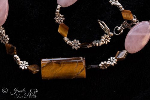 Tiger Eye Pink Agate necklace on black background