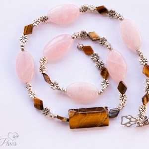 dog cat pet necklaces jewelry, pink agate oval stones and diamond shaped tigers eye beads with silver flower spacers and large tigers eye barrel bead on white background