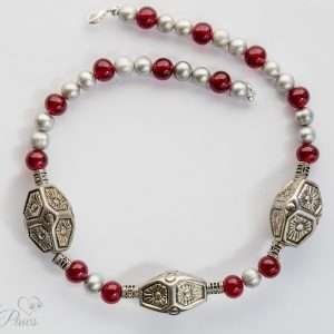 large dog cat pet necklace featureing three large silver indian style beads with freshwater pearls and red carnelians and filigree silver spacers on a white background