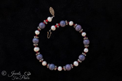 cat dog pet necklace marbleized blue beads with cultured pearls red crystals and swarovski crystal channel set spacers on black background