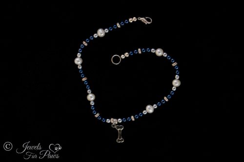 cat dog pet necklace for small dogs or cats navy blue and silver beads with cultured pearls and hanging silver dog bone charm on white background