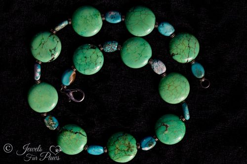 Green Turquoise necklace with blue turquoise spacers on black background