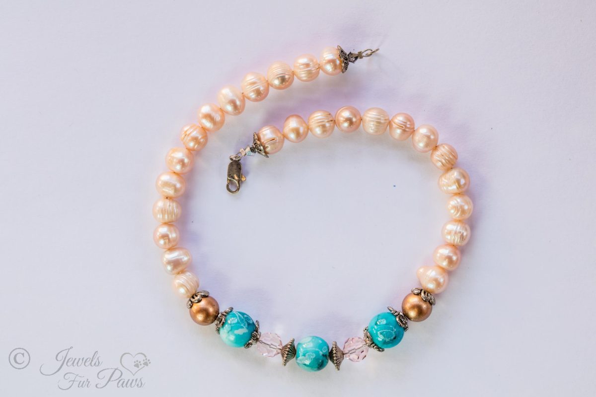antique vintage Japanese cultured pearls complementing three turquoise marbleized bads with two copper pearls and pale pink crystals