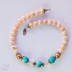 antique vintage Japanese cultured pearls complementing three turquoise marbleized bads with two copper pearls and pale pink crystals