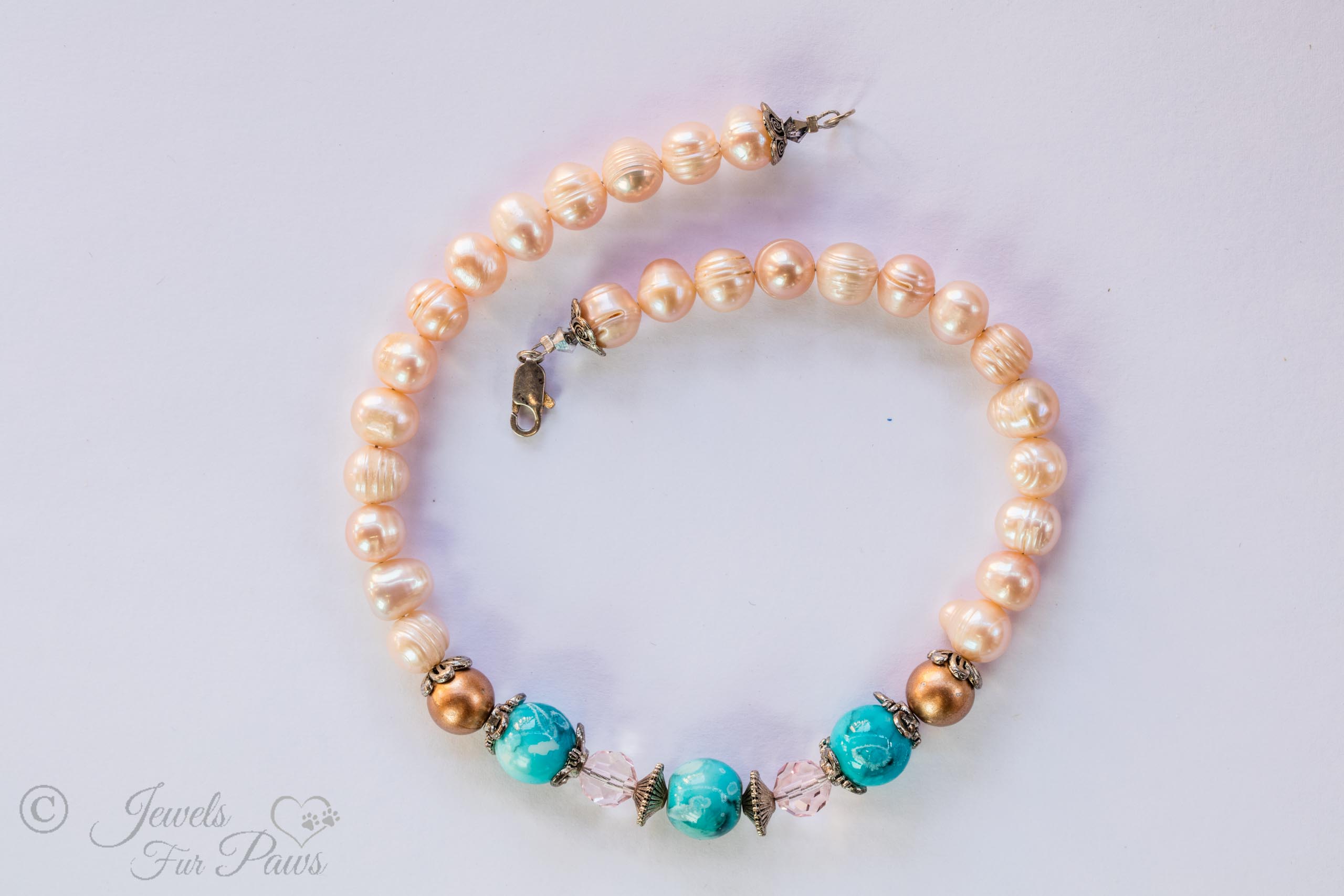 antique vintage Japanese cultured pearls complementing three turquoise marbleized bads with two copper pearls and pale pink crystals