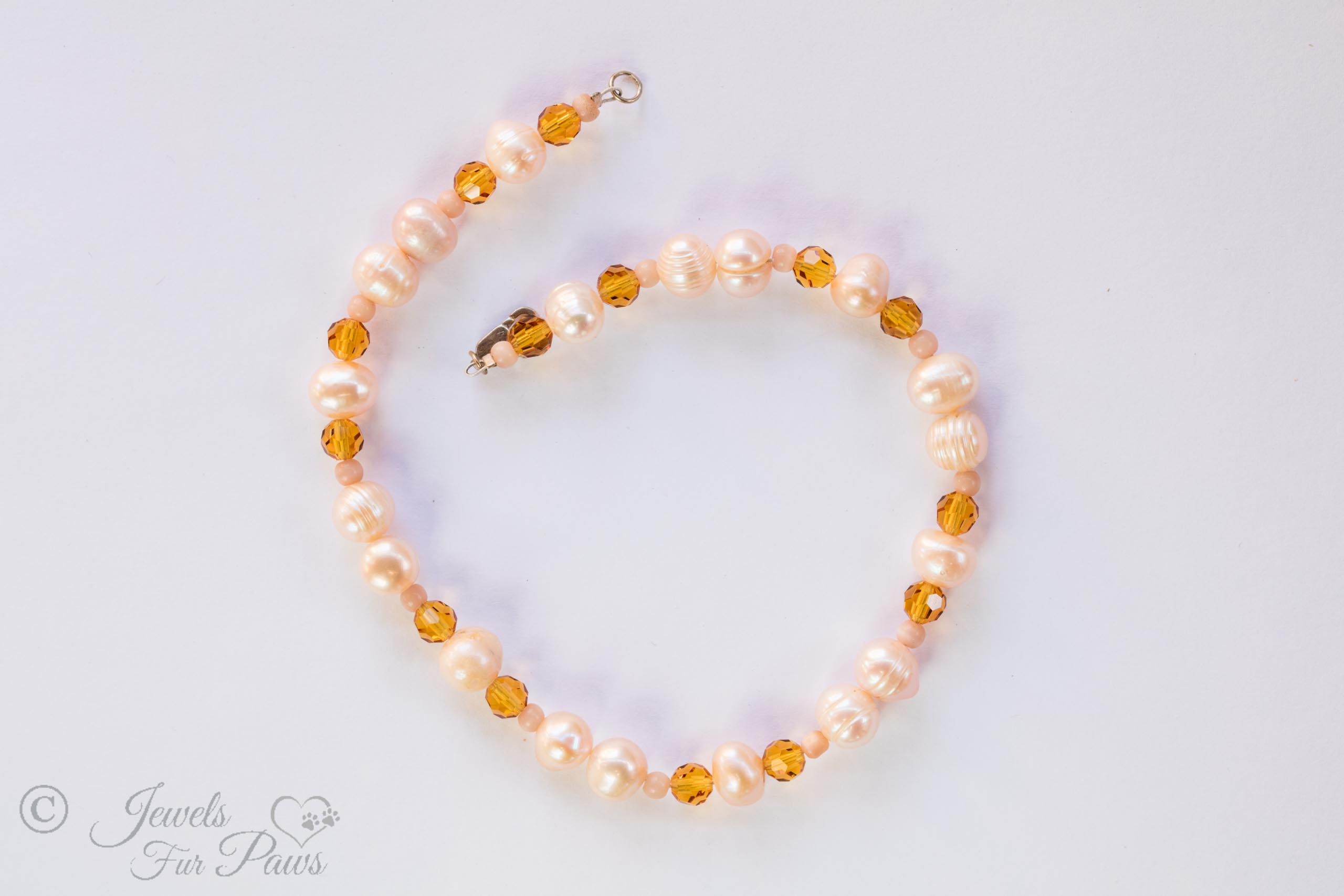 cultured pearls strung with amber czech crystals