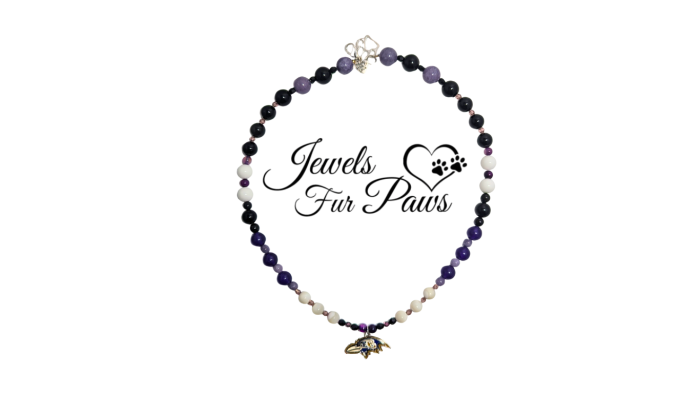 Handcrafted Baltimore Ravens pet necklace with purple jade, white agate, onyx beads, and gold lava for football fans.