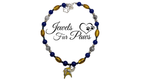 Handcrafted Minnesota Vikings pet collar with purple and gold beads, official NFL logo charm, and chakra-inspired gemstones for dogs or cats.