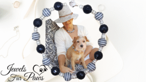 Matching pet and owner jewelry set featuring a handmade beaded dog necklace with black and striped beads, rhinestone spacers, and cultured pearls.